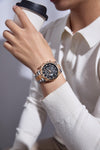 London Fog Analog Quartz Watch for Men with Black Round Skeleton-Style Dial, Textured Bezel, Luminous Hands and Markers, Date Display, Silver & Rose Gold Two-Tone Stainless Steel Bracelet - LFM10016-22