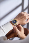 London Fog Analog Quartz Watch for Men with Blue Textured Round Dial, Day-Date Display, Roman Numeral and Crystal-Accent Hour Markers, Two-Tone Silver & Gold Stainless Steel Bracelet - LFM10017-55