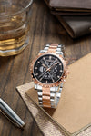 London Fog Analog Quartz Watch for Men with Black Round Skeleton-Style Dial, Textured Bezel, Luminous Hands and Markers, Date Display, Silver & Rose Gold Two-Tone Stainless Steel Bracelet - LFM10016-22