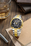 London Fog Analog Quartz Watch for Men with Black Round Skeleton-Style Dial, Textured Bezel, Luminous Hands and Markers, Date Display, Silver & Gold Two-Tone Stainless Steel Bracelet - LFM10016-44