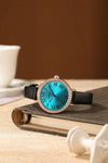 London Fog Analog Quartz Watch for Women with Turquoise Blue Round Dial, Roman Numeral Hour Markers, Crystal-Studded Bezel and Black Leather Strap - LFW20007-01